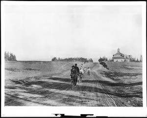 Cyclists participating in sponsored by the Los Angeles Times Bicycle Club Run, Pico Boulevard near Western Avenue, looking east, September 4, 1895