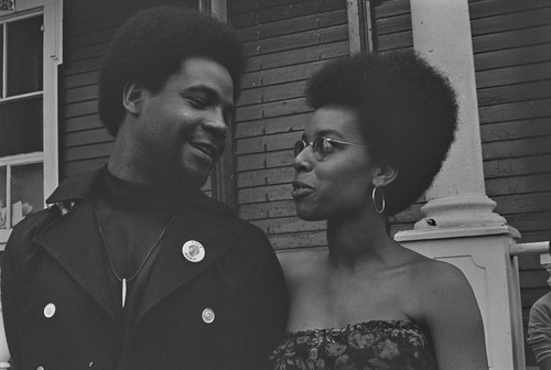 Emory Douglas, Minister of Culture and Revolutionary Artist for the Black Panther Party with sister Barbara E. at Free Huey Rally, Bobby Hutton Memorial Park, #88 from A Photographic Essay on The Black Panthers