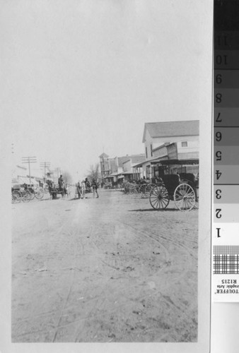 Horse drawn buggys and wagons remain as transportation in Turlock, California, circa 1908