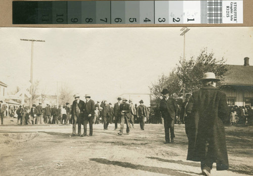 Prospective land buyers walk around Turlock, California, circa 1907