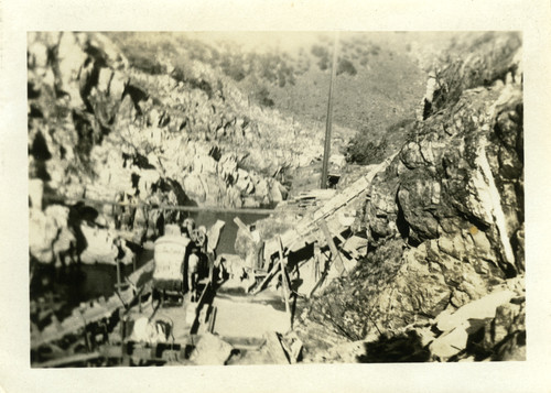 Early construction of the Old Don Pedro Dam, circa 1922
