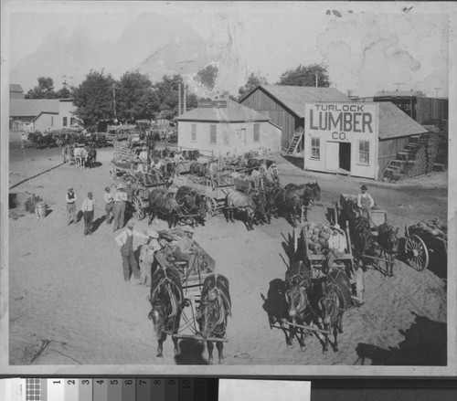 Wagons of watermelons in front of the Turlock Lumber Company
