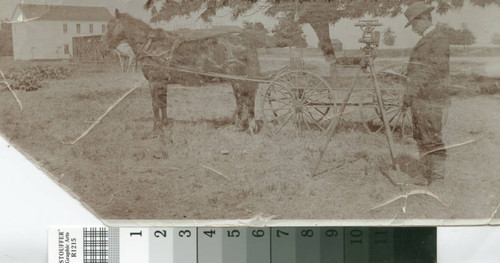 Unidentified land surveyor at work near Turlock, California, circa 1905