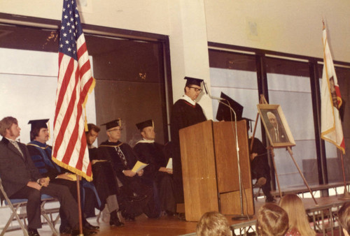 Mr. James Atkinson reading the Founder's Address , first given by Mr. Pepperdine in 1937