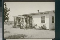 No. 224. Mrs. Matt Williams and her daughter, allot. 245, showing utilization of poultry house as temporary living quarters. August 14, 1923