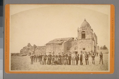 [Group standing near ruins of old San Carlos mission, Carmel: occasion of the opening of grave of Father Junipero Serra. July 3, 1882. (Not stereographic)]