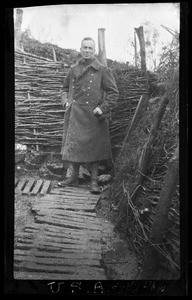View of a soldier standing in a trench during the First World War, ca.1916