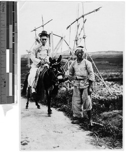 Man traveling by burro, Korea, ca. 1920-1940