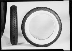 Tires in studio showing tread & white side, Southern California, 1932