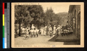 Missionaries standing with others, Malawi, ca.1920-1940