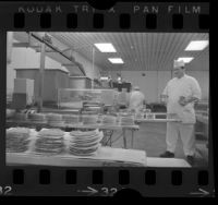 Bob's Big Boy food processing plant; machines turning out hamburger patties in Glendale, Calif., 1966
