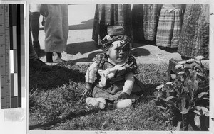 Baby wearing fiesta costume, Guatemala City, Guatemala, ca. 1946