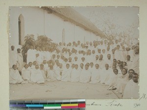 Leprous patients gathered outside the church, Ambohipiantrana, Antsirabe, Madagascar, 1901