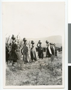 Women carrying beer jars on their heads, Ehlanzeni, South Africa