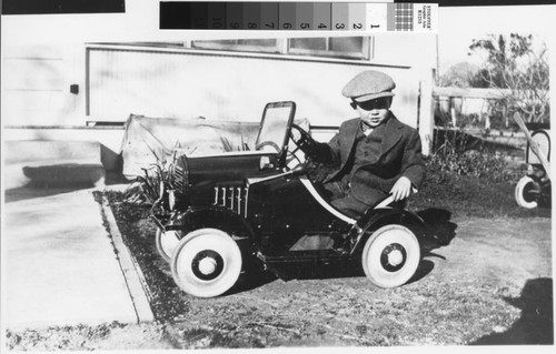 Photograph of Don Burtis and first car