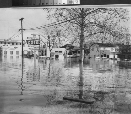 Photograph of Earl R. Huffmaster Used Cars after 1955 flood