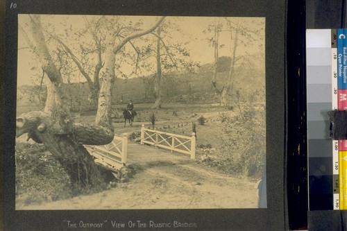 "The Outpost." View of the rustic bridge