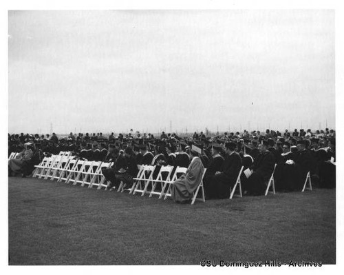 Seated graduates at commencement