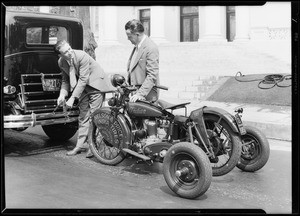 Motorcycle at Packard agency, Hollywood, Southern California, 1929