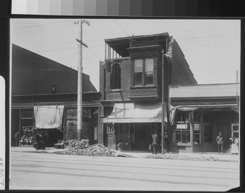 [Oakland storefronts. Unidentified location.]