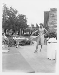 Knee-length split tunic and capris modeled at the Sword of Hope fashion show at the Flamingo Hotel, Santa Rosa, California, June 18, 1960