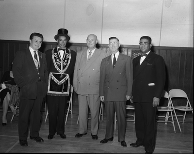 Al Fulcher (2nd from the left) standing with four men