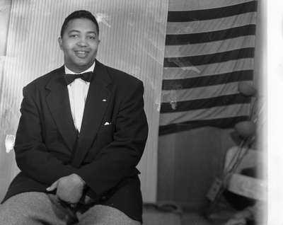 Portrait of man in bow tie seated