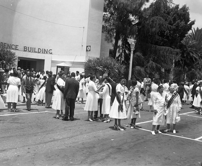 Members of the Order of the Eastern Star standing outside conference building