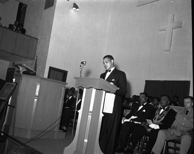 Man standing at podium