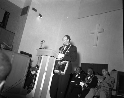 Al Fulcher standing at podium