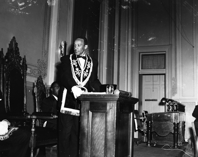 Al Fulcher standing at podium