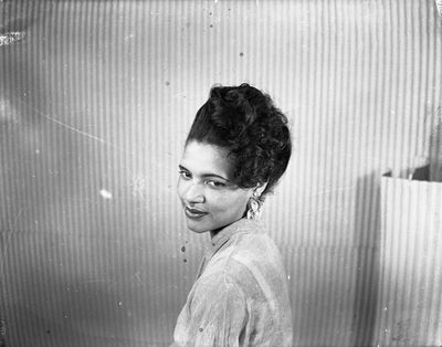 Portrait of woman in striped shirt