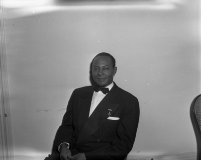 Portrait of man in bow tie seated