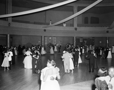 Couples dancing in banquet hall