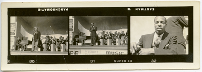 Jimmy Bussing, Count Basie, and Joe Jones performing on stage at the Golden Gate International Exposition