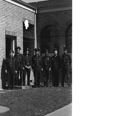 Group photograph of Oakland firefighters standing in front of fire engine no. 22