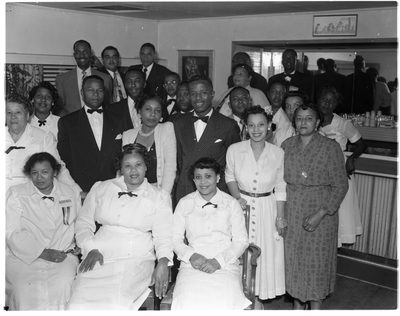 Group photograph of men and women