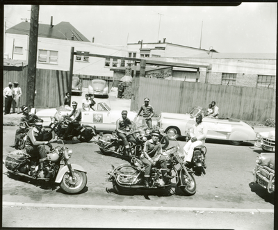 Berkeley Tigers Motorcycle Club parked in street