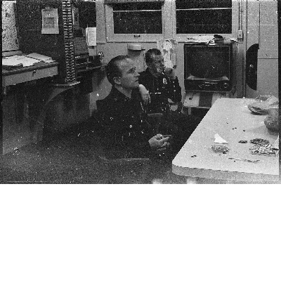 Two Oakland firefighters sitting in office