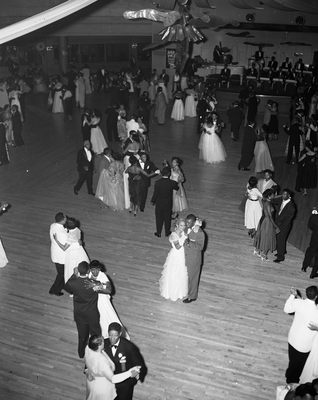 Couples dancing on dance floor at Jack and Jill event