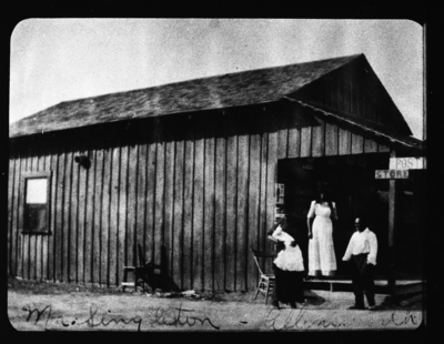 Mr. Singleton and two women standing outside Allensworth store