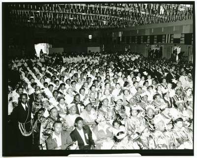 Masons and members of the Order of the Eastern Star seated in large banquet hall