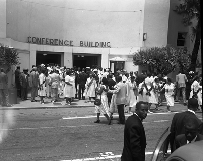 Members of the Order of the Eastern Star standing outside conference building