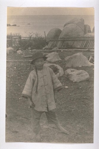 [Chinese boy. Unidentified location.]