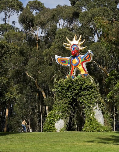Sun God: general view of sculpture with arch and vines