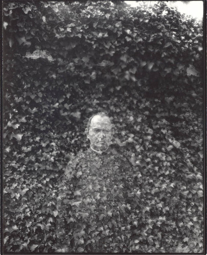 Double exposure of Fr. Riordan