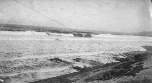The Whale Rock during a small storm at the beach in front of Scripps Institution for Biological Research, which would become Scripps Institution of Oceanography. 1919