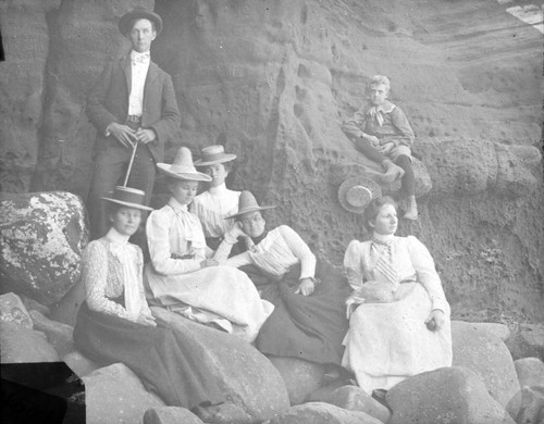 [Group portrait in front of a cliff]