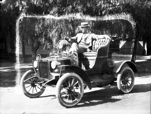 Upland Photograph Street Scenes; Automobile parked at the curb / Edna Swan