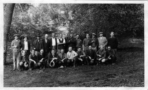 Upland Photograph Events; Upland Fire Department Camping Trip: 23 men kneeling or standing in San Antonio Canyon